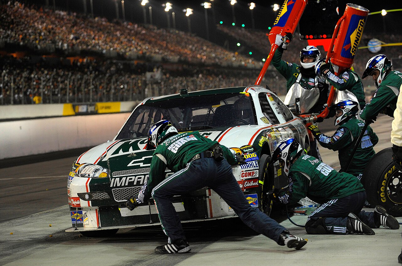 Darlington Raceway — Dale Earnhardt, Jr. on pit road, as his team completes a pit stop during the 2008 Dodge Challenger 500 at Darlington Raceway on May 10, 2008