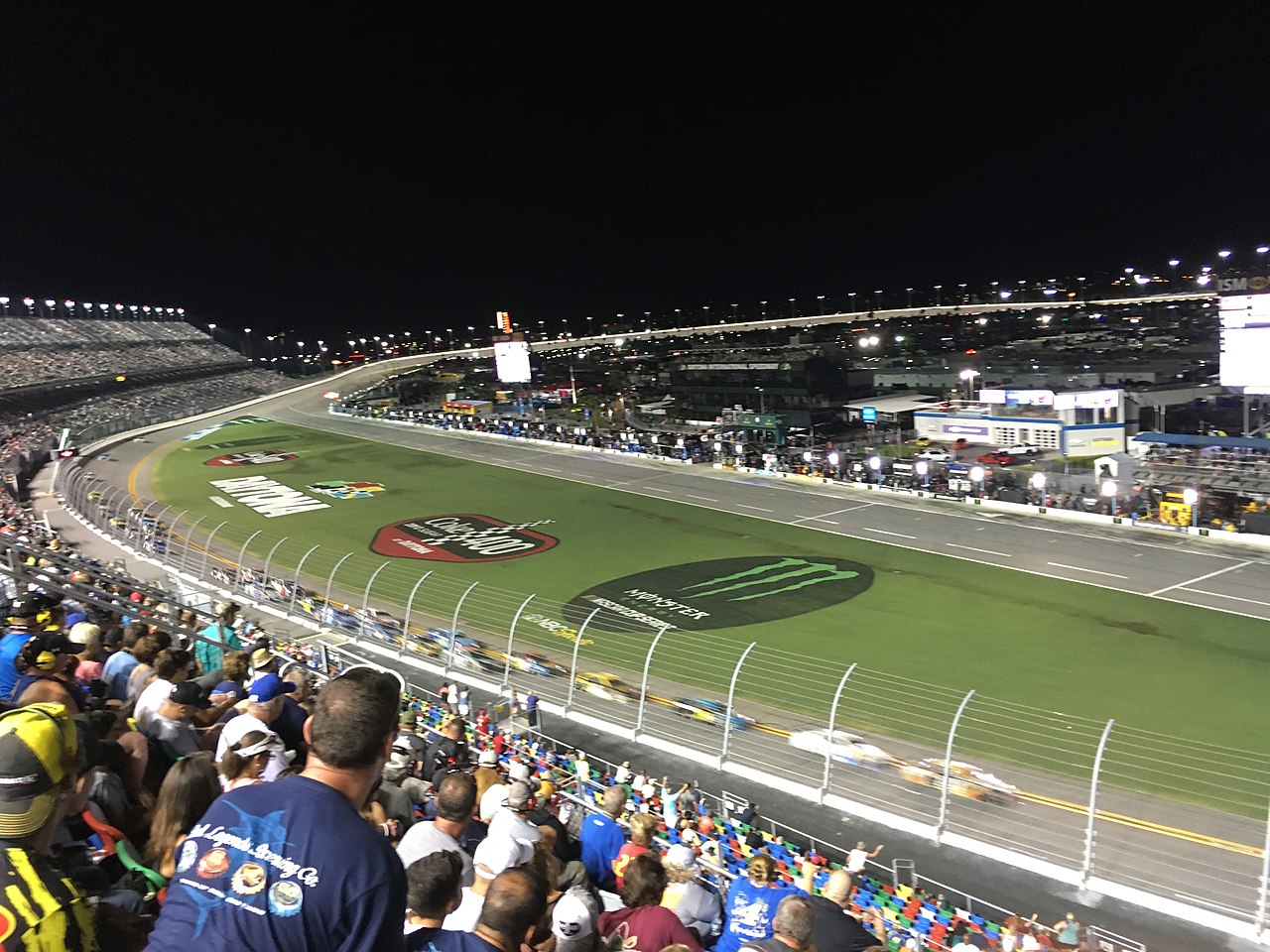 Daytona International Speedway — The final stage of the 2018 Coke Zero Sugar 400 at Daytona International Speedway viewed from the frontstretch, with Clint Bowyer (#14) lead