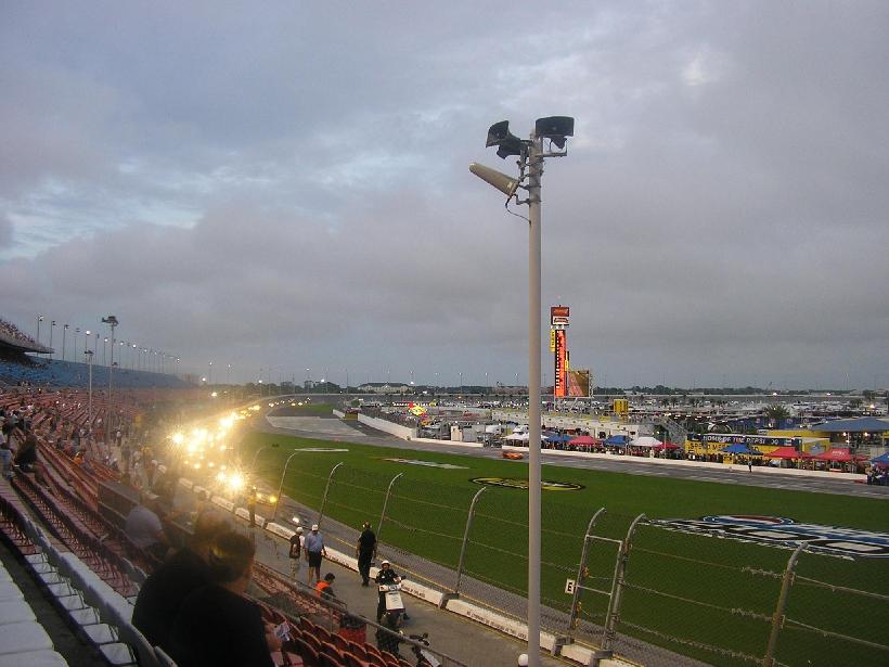 Daytona International Speedway — Contestants in the Brumos Porsche 250 resume at regular speeds after a caution is lifted. The race is held at Daytona International Speedway