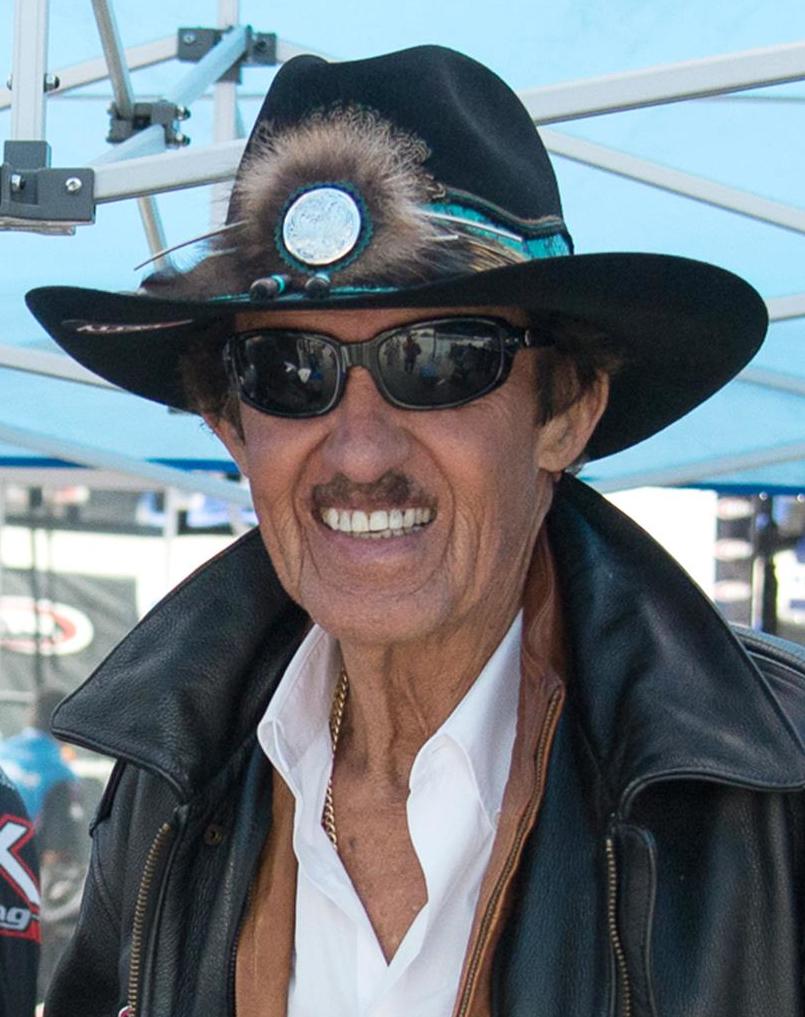 Dover Motor Speedway — Tech Sgt. Brandon Vazquez, 436th Maintenance Operations Squadron, poses for a photo with Richard Petty, NASCAR legend and owner of the No. 4
